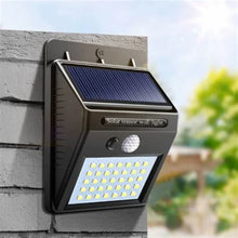 Load image into Gallery viewer, Solar charged  Led wall light for electricity savings
